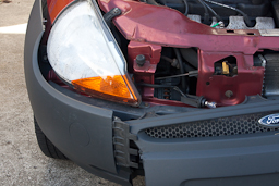 Fogged headlight and initial bumper opening.