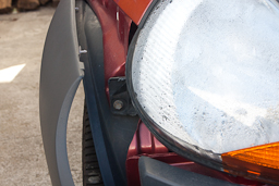 Closeup of the third hidden bolt behind the bumper.