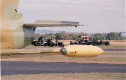 A variety of WW2 vintage vehicles race across the field to deal with the attackers. (54Kb jpeg)