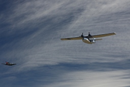 Catalina and Kittyhawk against clouds. (191Kb jpeg)